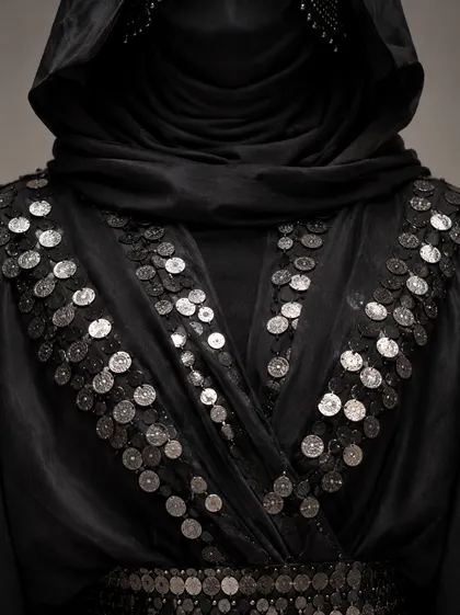 Character reference: costume detail below the neck
